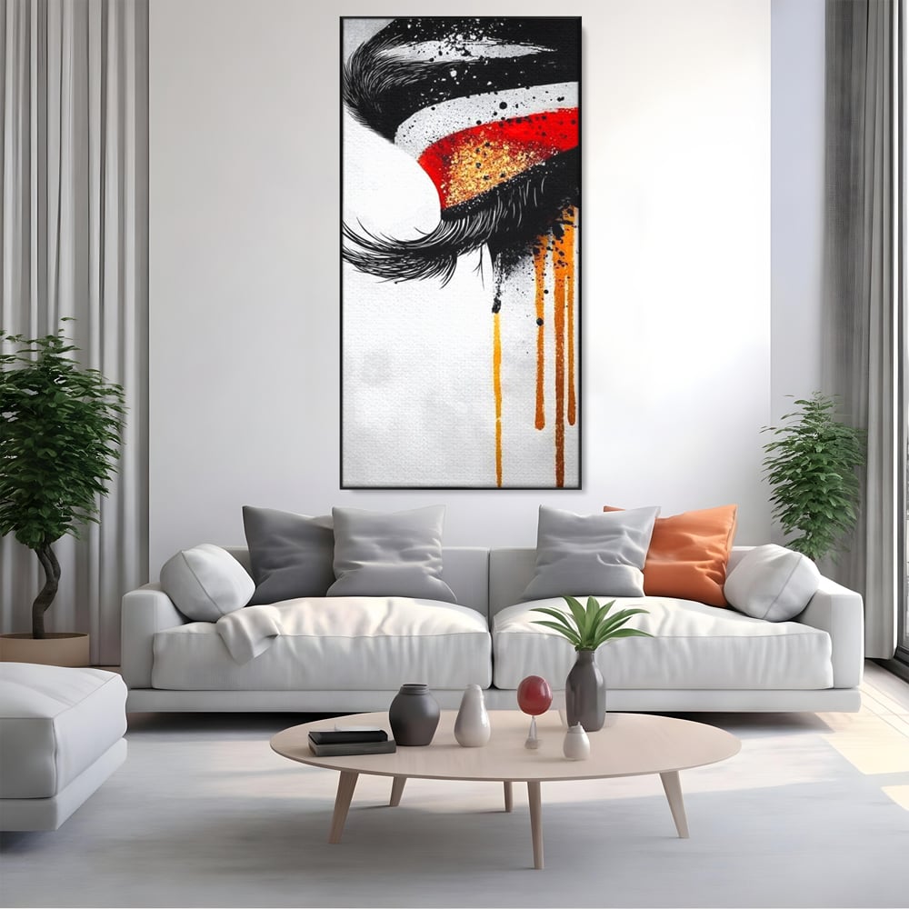 Tablou canvas cu tablou canvas cu ochi stilizat, in rama de aluminiu negru, pe perete intr-un living